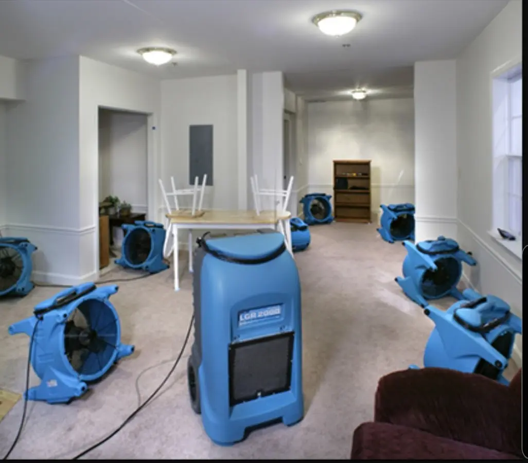 Air movers and dehumidifier setup for Water Extraction & Removal in Scio